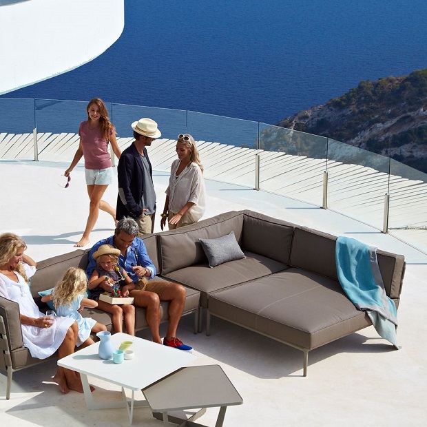 Conic daybed module sofa by Cane-Line on a rooftop