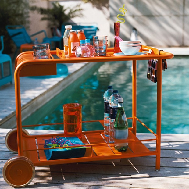 Luxembourg trolley by Fermob next to a swimming pool
