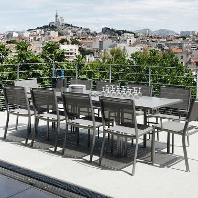 Costa extending table and costa armchairs on a terrace